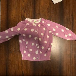 Cherokee light purple sweater with white dots.  It is for a 12 month little girl